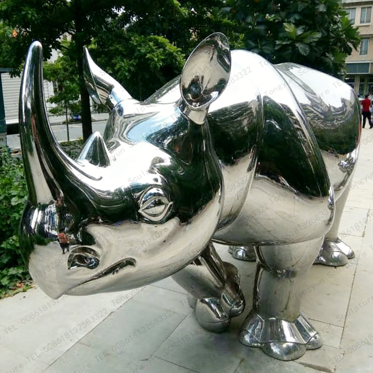 Modern industrial Reinforced steel mirror stainless steel metal rhinoceros sculpture.jpg