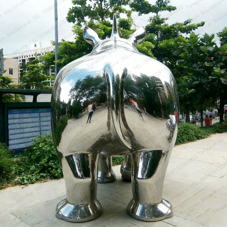 Modern industrial Reinforced steel mirror stainless steel metal rhinoceros sculpture.jpg