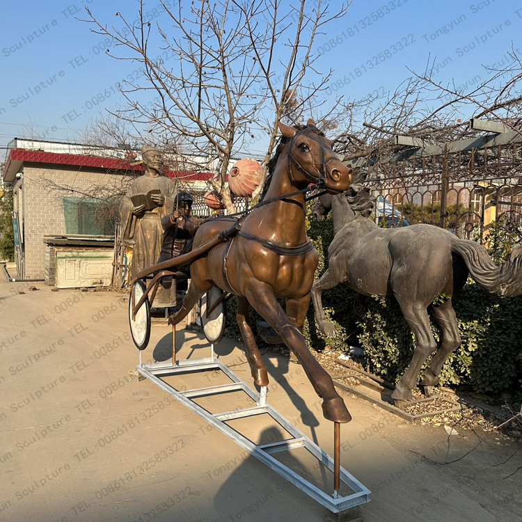 Bronze Horse Carriage Sculpture in Maria’s backyard.jpg